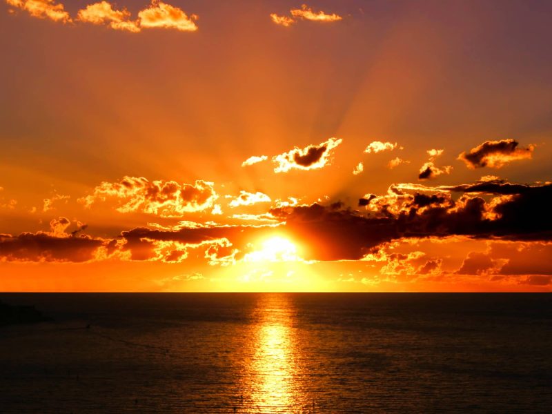 vibrant-sunset-over-the-ocean-with-clouds-and-sunb-2026-03-26-06-27-12-utc (1)